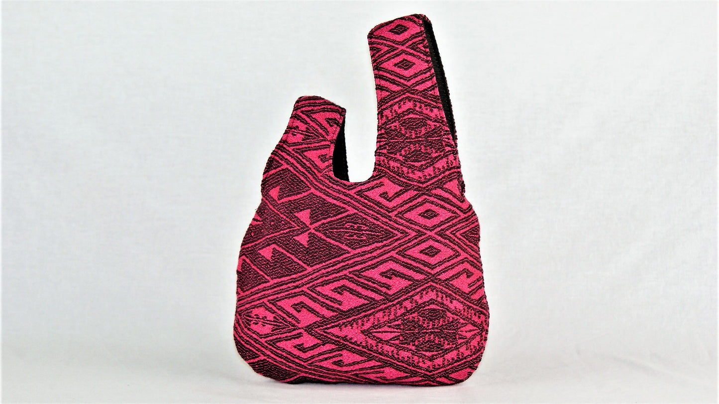 Borsa Geometrical pink wrist bag