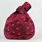 Borsa Geometrical pink wrist bag