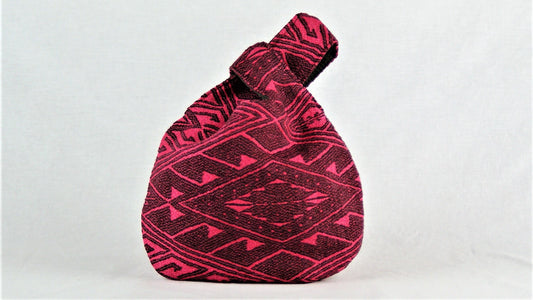 Borsa Geometrical pink wrist bag