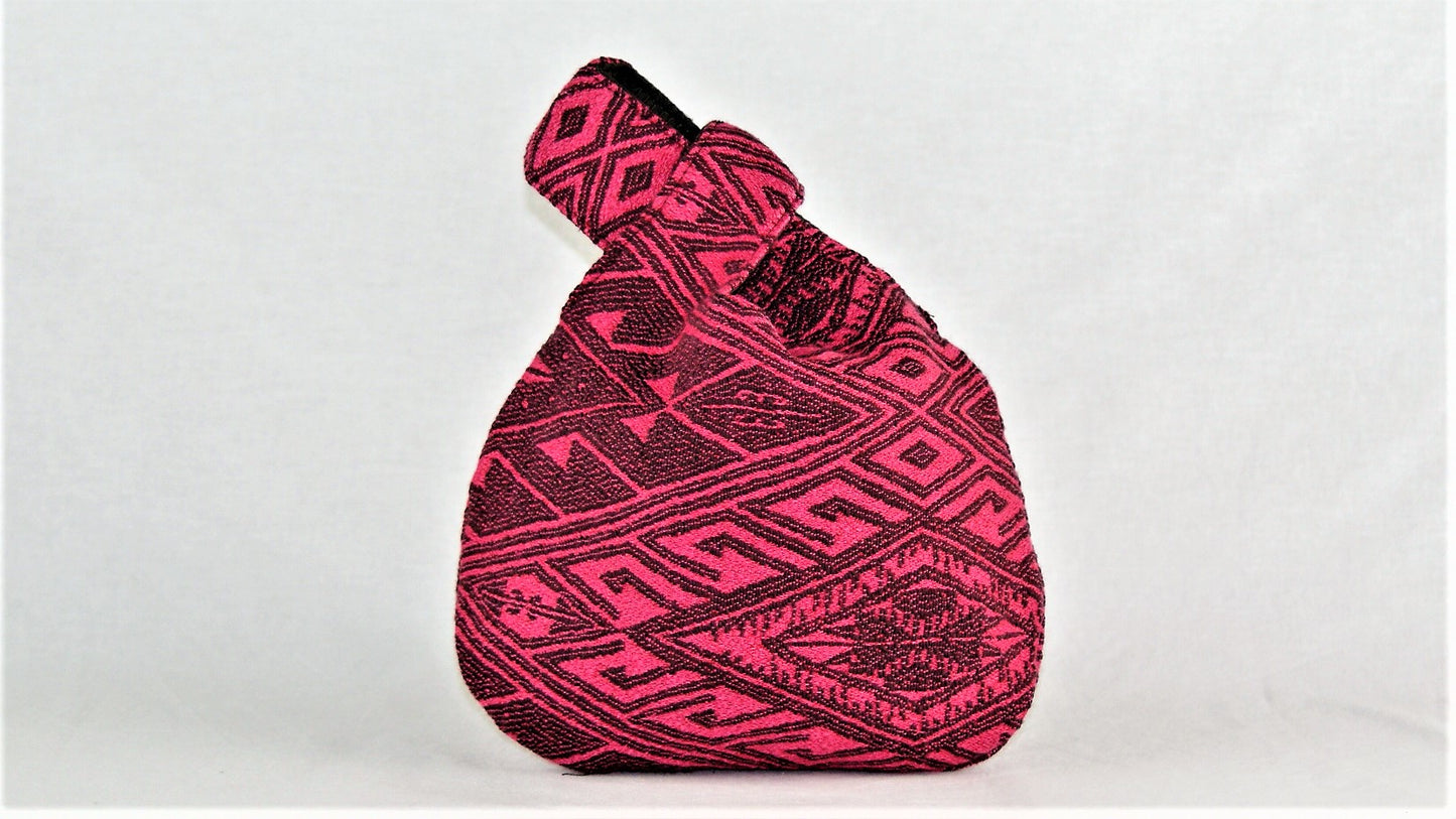 Borsa Geometrical pink wrist bag